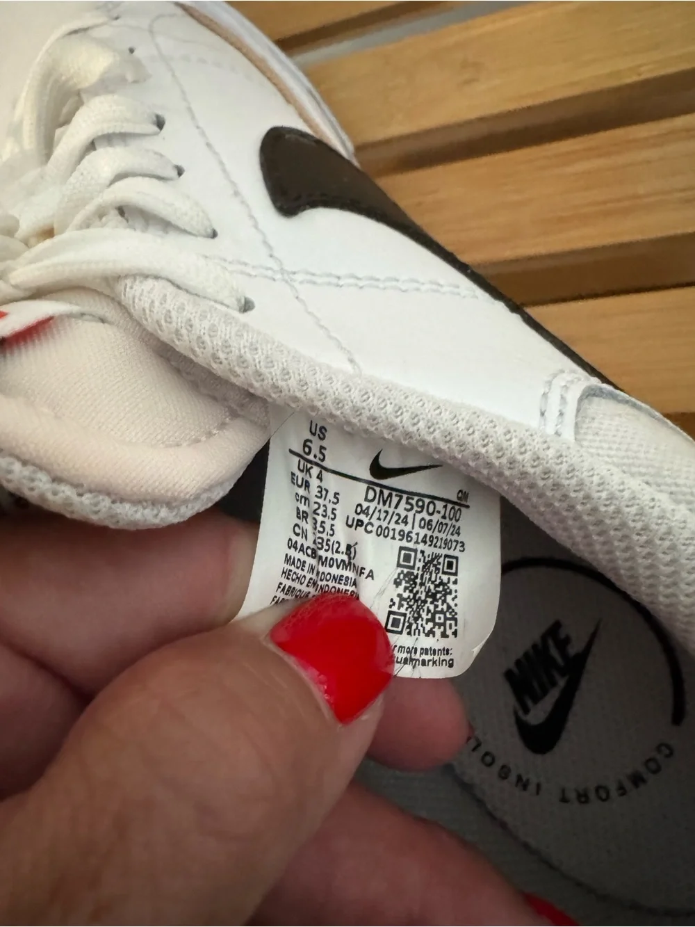 Nike White Low-Top Platform Sneakers with Black Swoosh